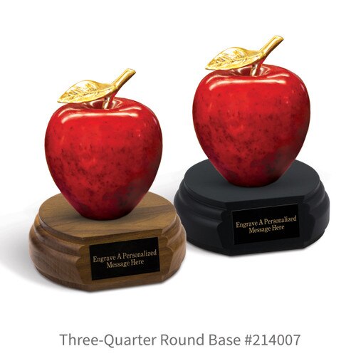 black and a brown walnut three-quarter round bases with black brass plates and natural stone apples