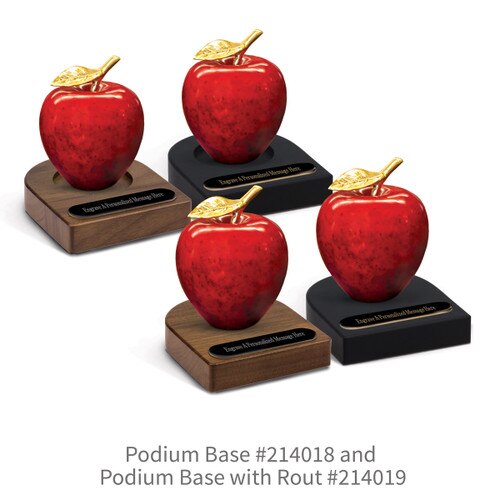 black and brown walnut podium bases with black brass plates and natural stone apples