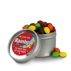 round tin with over the rainbow message and skittles