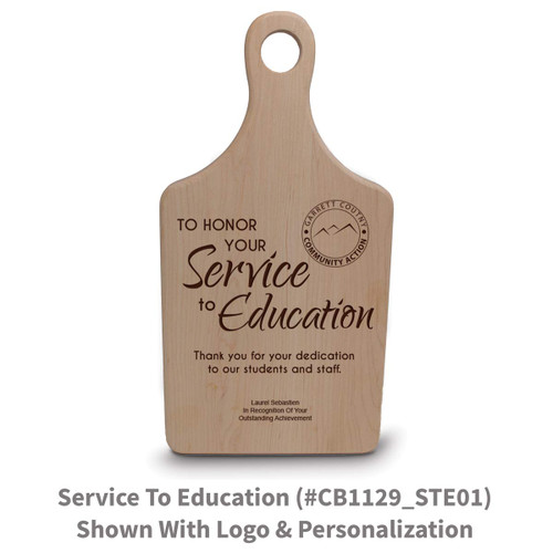 maple paddle cutting board with service to education message