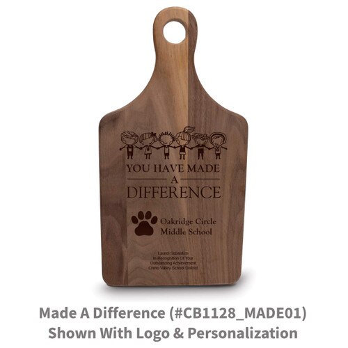 walnut paddle cutting board with made a difference message