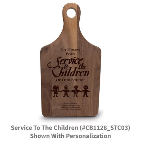 walnut paddle cutting board with service to the children message