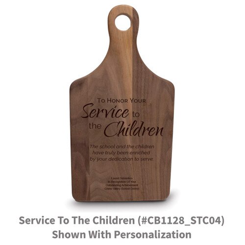 walnut paddle cutting board with service to the children message