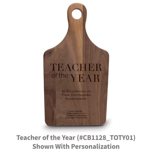 walnut paddle cutting board with teacher of the year message