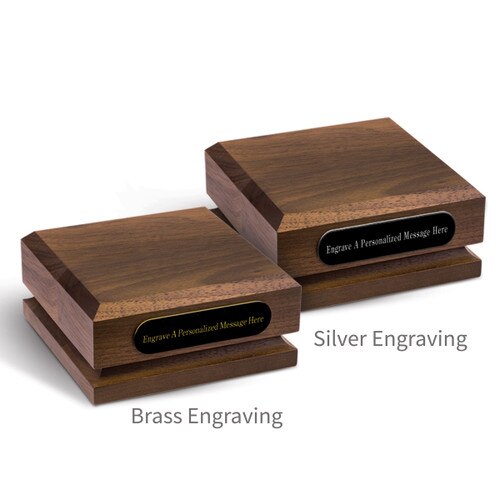 two walnut pedstal bases with personalized black brass plates