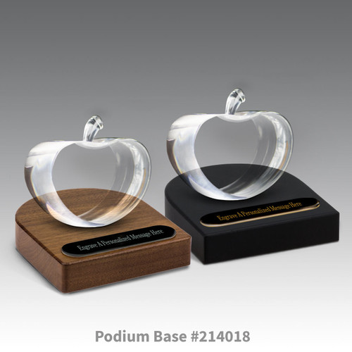 black and brown walnut podium bases with black brass plates and center cut optic crystal apples