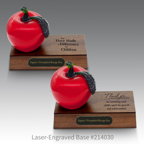 laser engraved walnut bases with black brass plates and red crystal apples