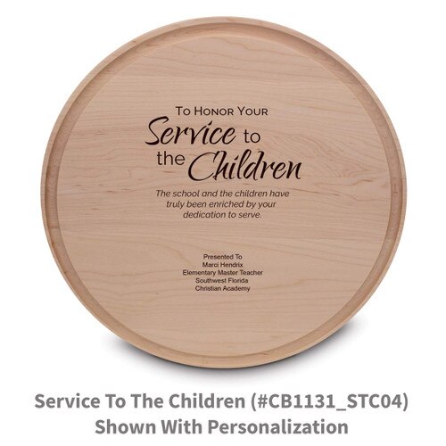 maple round cutting board with service to the children message