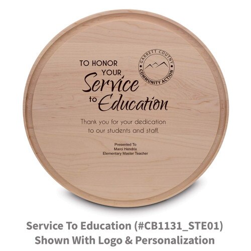 maple round cutting board with service to education message