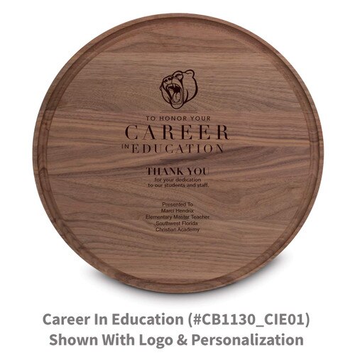 walnut round cutting board with career in education message