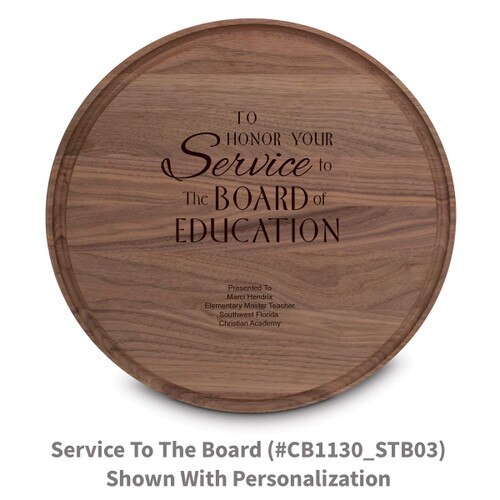 walnut round cutting board with service to the board message