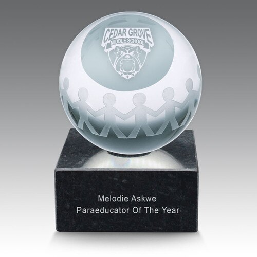 Service to education crystal globe featuring etched people holding hands. Genuine marble base, unattached.