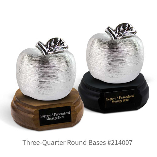 black and a brown walnut three-quarter round bases with black brass plates and silver spun apples