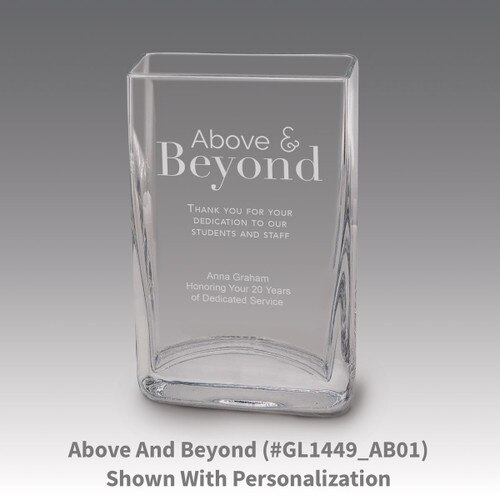 Small crystal vase featuring etched pre-designed above and beyond message.