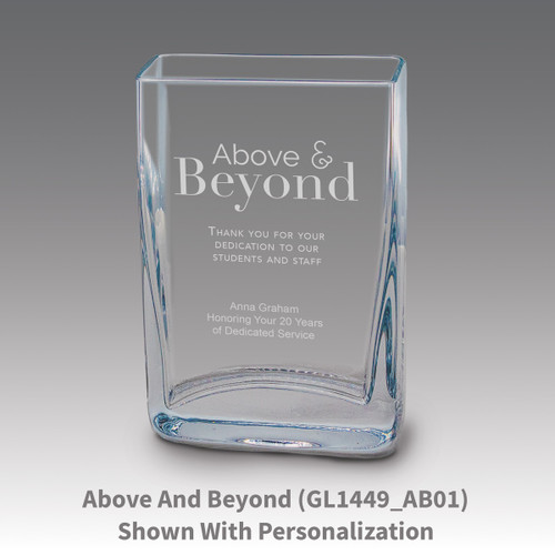 Small crystal vase featuring etched pre-designed above and beyond message.
