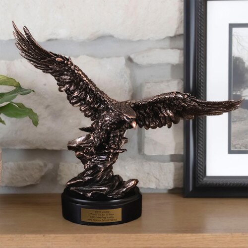 soaring eagle sitting on shelf