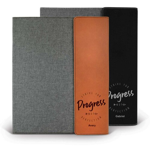heather gray padfolios with black and rawhide accents featuring Strive For Progress message