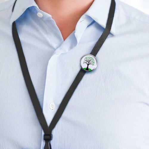 tree of life lapel pin on a lanyard