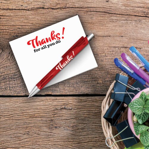 thanks for all you do notepad and pen sitting on a desk