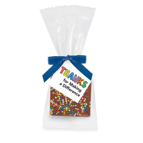 Bite-size Belgian chocolate square with rainbow sprinkle topping. Inspirational card reads “Thanks For Making A Difference”