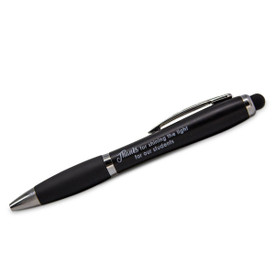 Black barrel light up pen with soft black grip and stylus tip. Message reads Thanks For Shining The Light For Students.