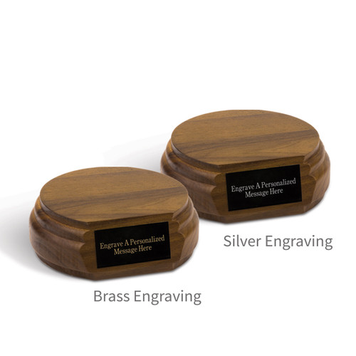 two walnut three-quarter round bases with personalized black brass plates