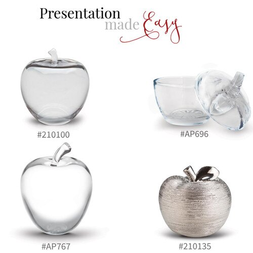 two crystal apple, a glass apple dish, and a silver spun apple