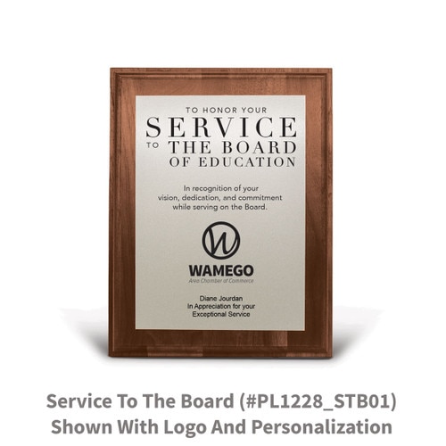 7x9 walnut plaque with brushed silver plate featuring service to the board message