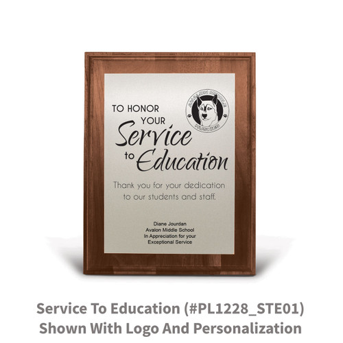 7x9 walnut plaque with brushed silver plate featuring service to education message