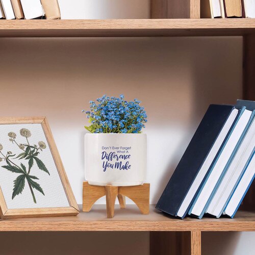 what a difference you make modern ceramic planter sitting on a shelf
