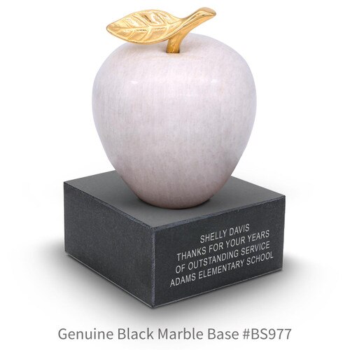black marble base with white marble apple