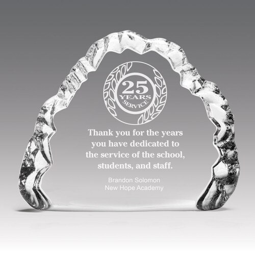 crystal iceberg award recognizing 25 years of dedication to the service of the school, students, and staff
