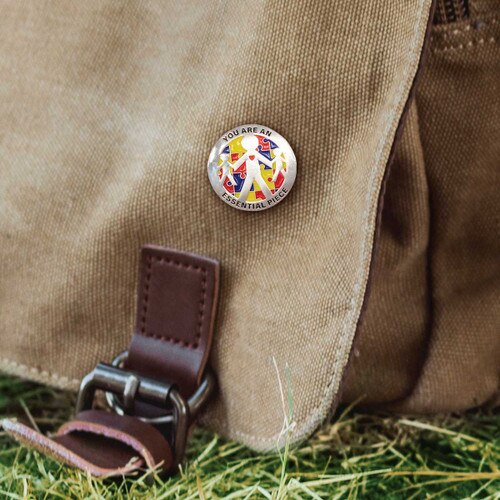 you are an essential piece lapel pin on canvas bag