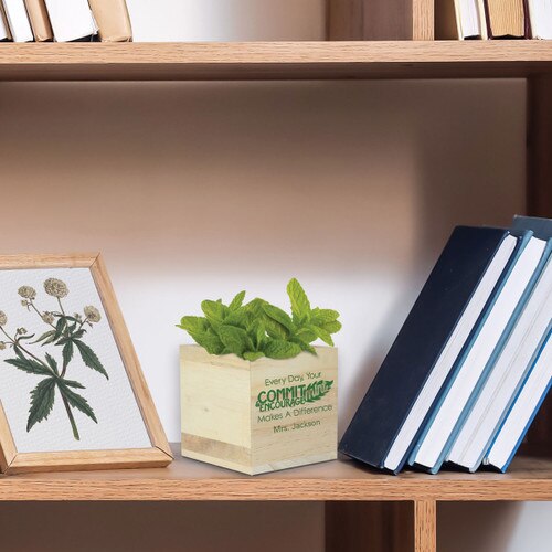 commit-mint wooden cube sitting on a shelf